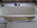 Before and after photos of resurfaced and refinished bathtubs in Austin, Texas.